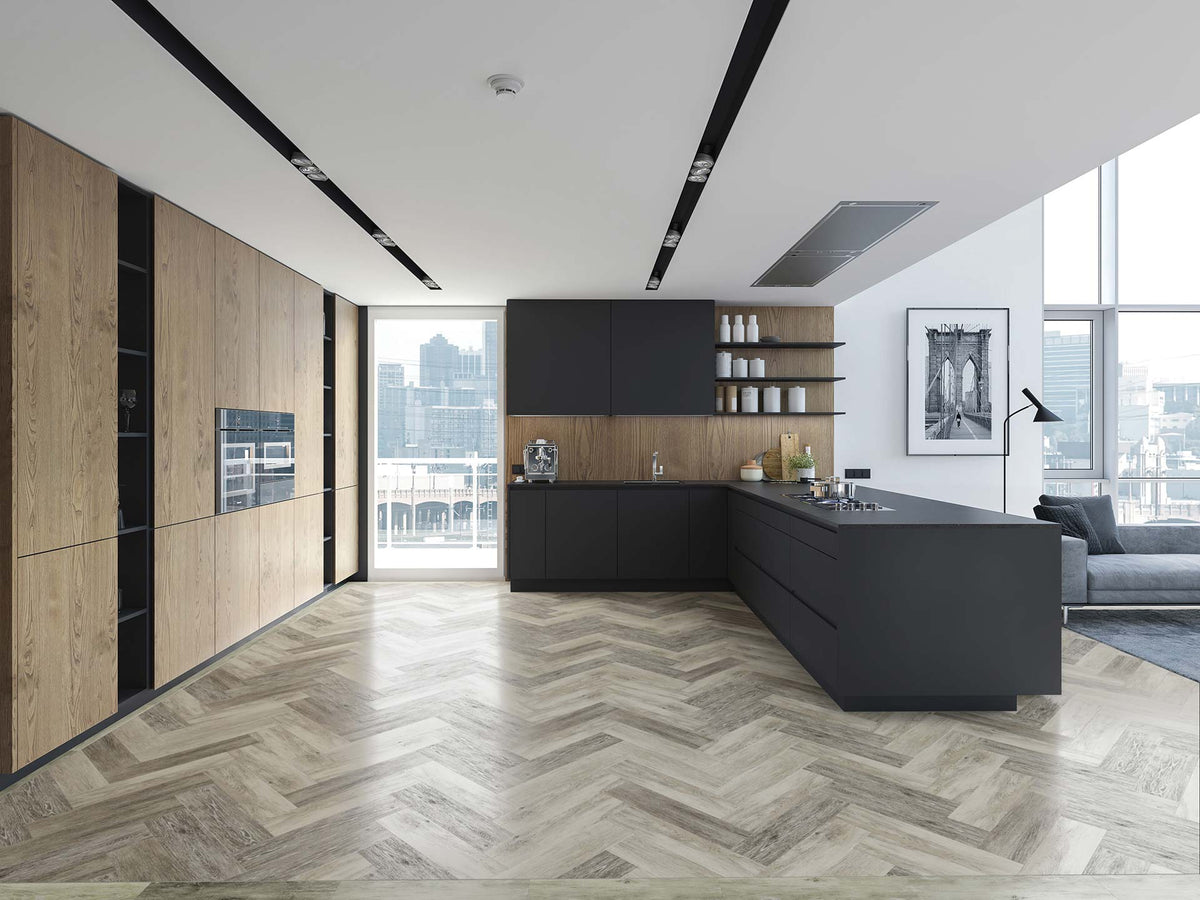 Ambiance luxury vinyl flooring in a grey herringbone pattern