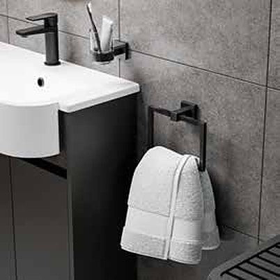 Artisa square towel ring in matt black beside a basin