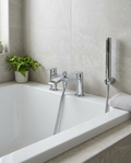 Arco Bath Shower Mixer in a bright modern bathroom