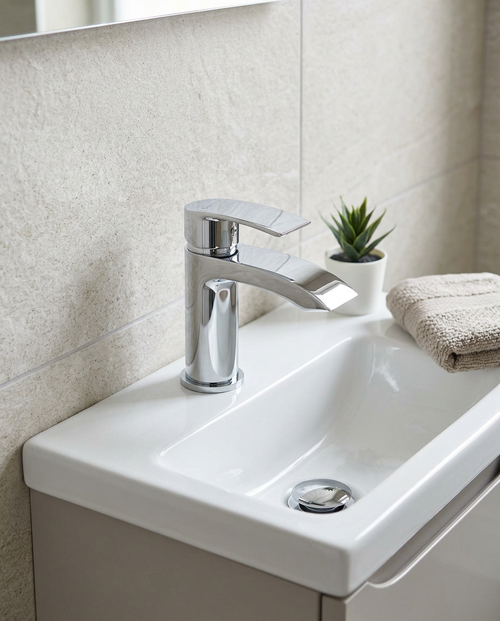 Arco Mini Mono Basin Mixer in a bright modern bathroom