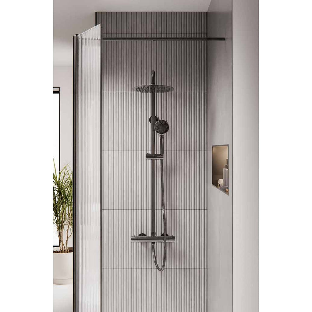 Artisa exposed thermostatic drench shower in a walk-in shower