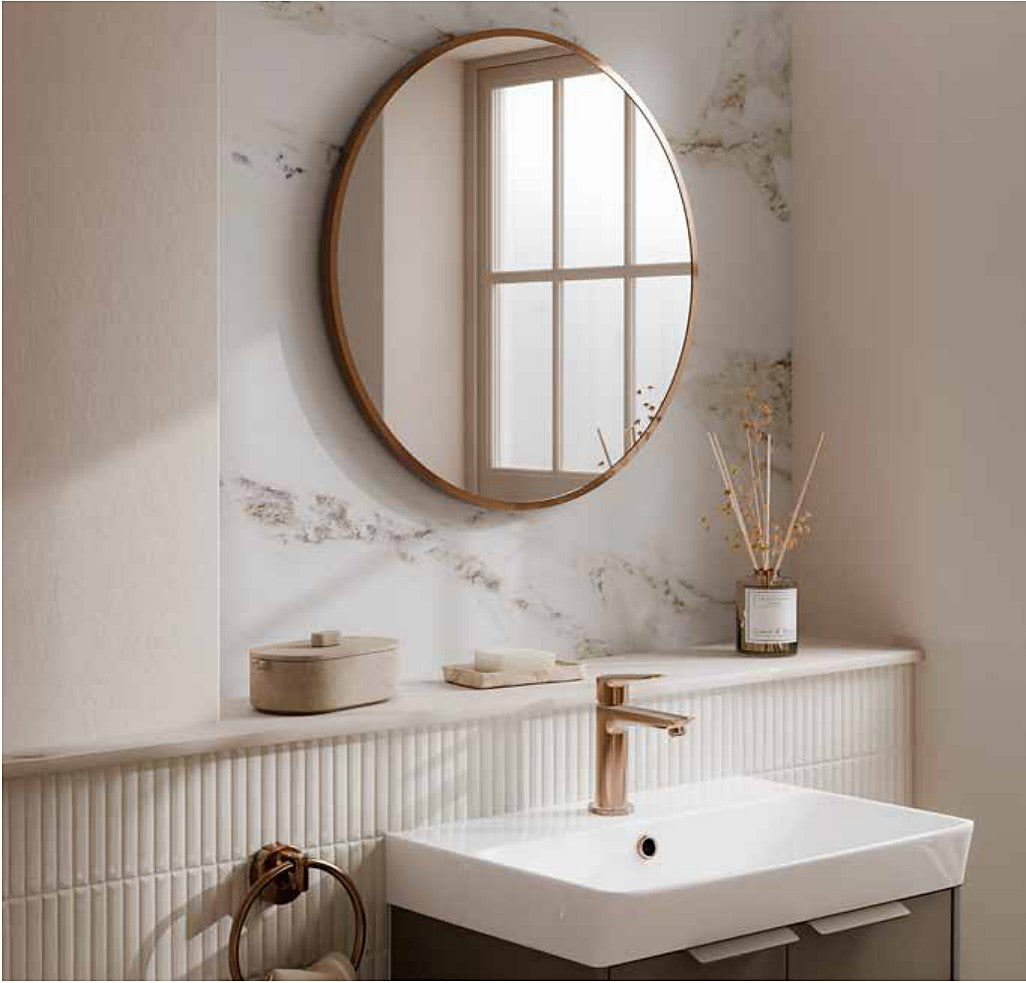 Astria Round Framed Mirror in a bathroom setting