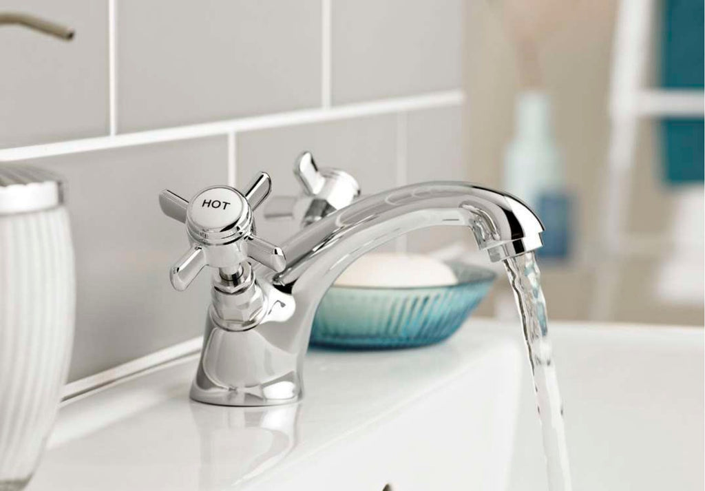 Clarence taps in a bathroom