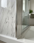 Cove 10mm Wall Panel Trims, chrome in a bright modern bathroom