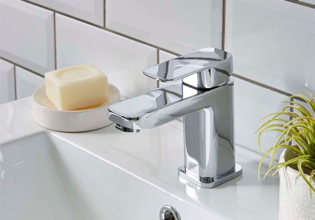 Dara taps in a bathroom