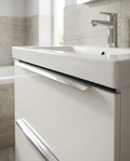 Fenwick Handles and Overflow Covers, chrome in a bright modern bathroom