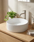 Grova Fluted Countertop Basin in a bright modern bathroom