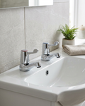 Hale Basin Taps in a bright modern bathroom