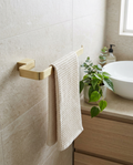 Halo Towel Ring, brushed brass in a bright modern bathroom