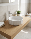 Lunar Textured Round Sit-On Basin in a bright modern bathroom