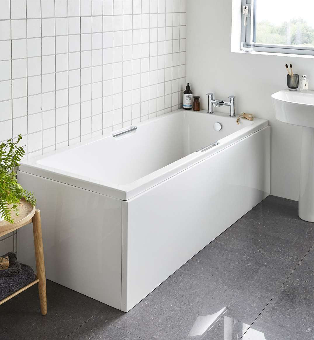 Lusso Twin Grip Single Ended Bath, in a bathroom with front panel