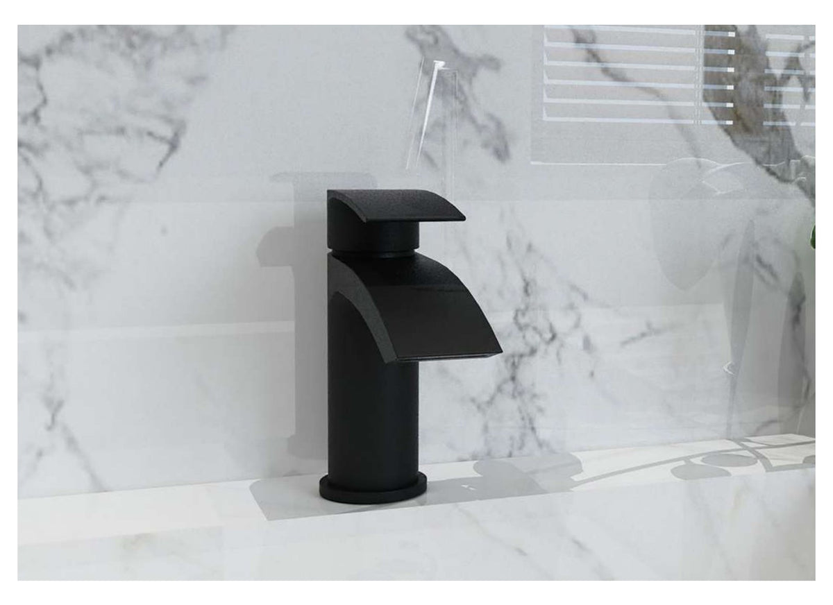 Noxa Curve taps in a bathroom