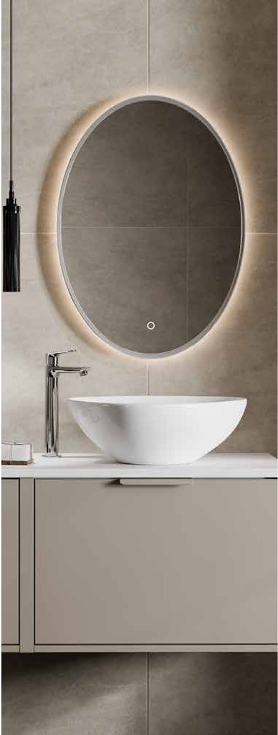 Orbita Framed Oval LED Mirror in a bathroom setting