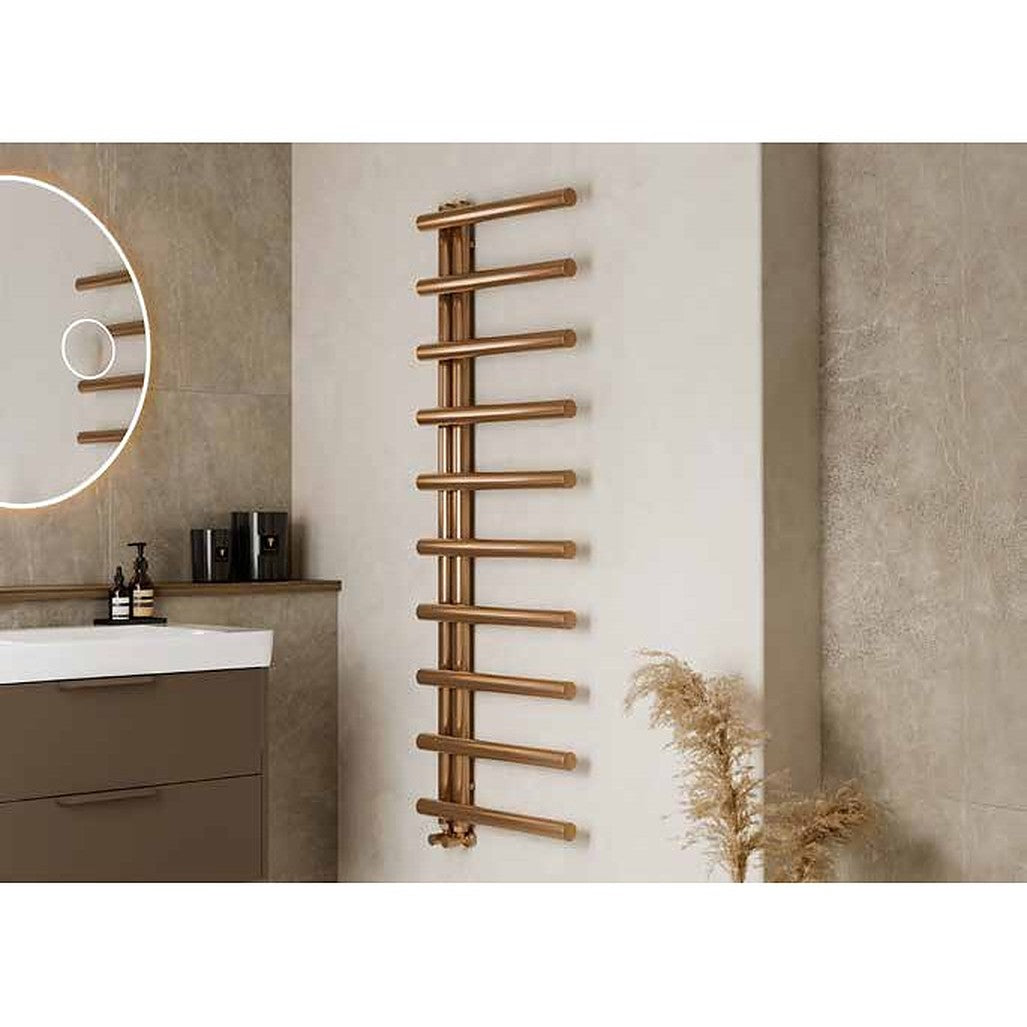 Orisa designer towel radiator in brushed bronze in a bathroom