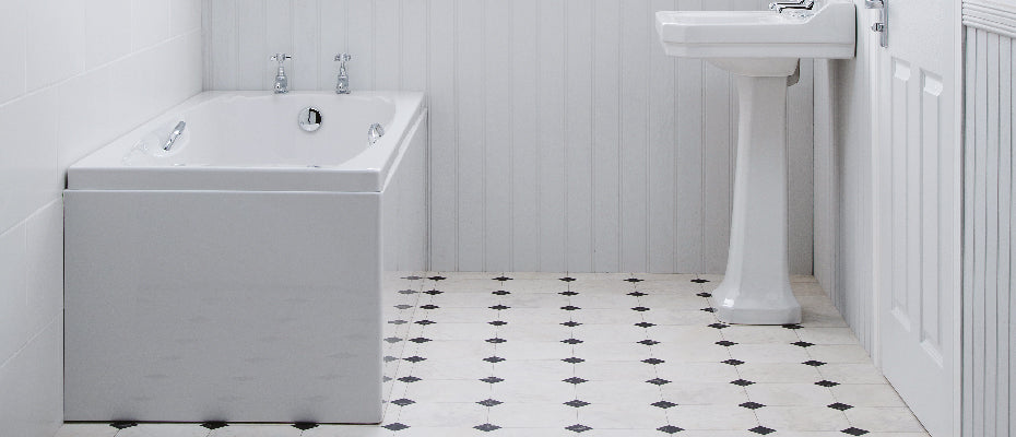 Carron Imperial Twin Grip Single Ended Bath, in a bathroom setting