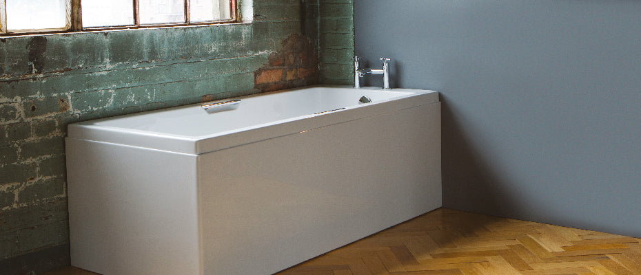 Carron Integra Twin Grip Single Ended Bath, in a bathroom setting