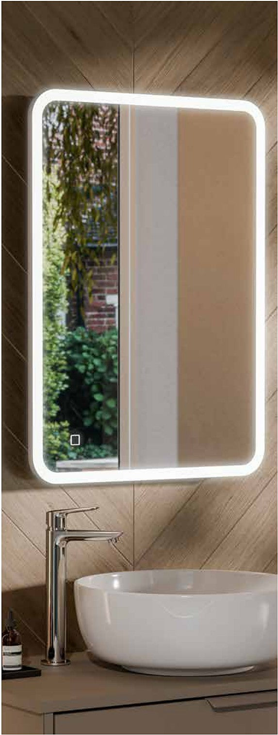 Selena LED Mirror with Shaver Socket in a bathroom setting