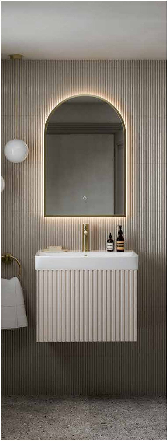 Serena Framed Arch LED Mirror in a bathroom setting