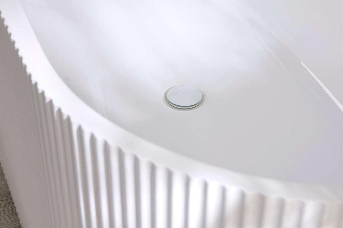 Close-up of the Sofie fluted bath edge and waste