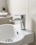 Vela Mini Mono Basin Mixer in a bright modern bathroom