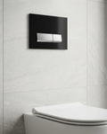 WC Frame Flush Plates, black glass, chrome buttons in a bright modern bathroom