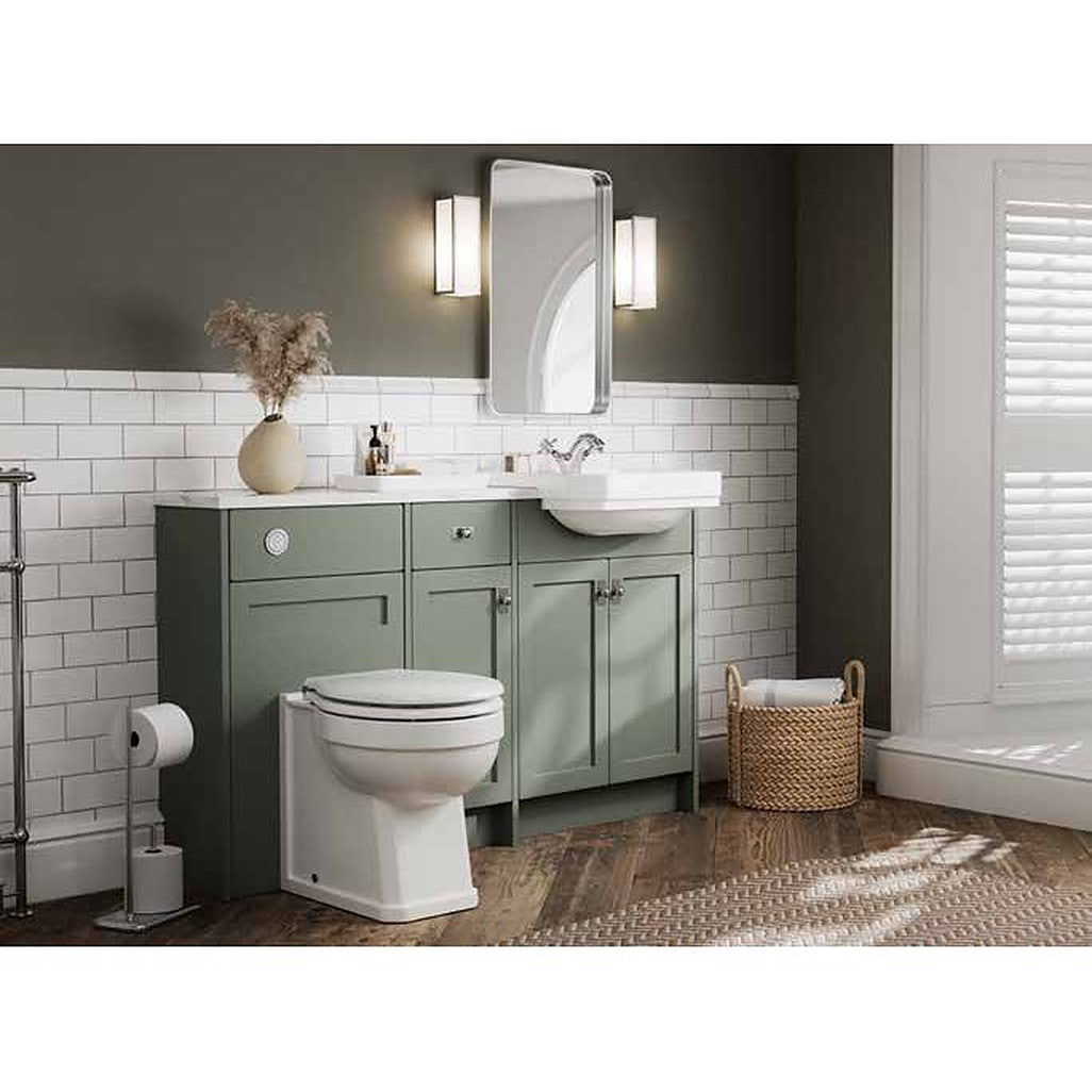 Windham back to wall toilet and semi-recessed basin in a traditional green bathroom